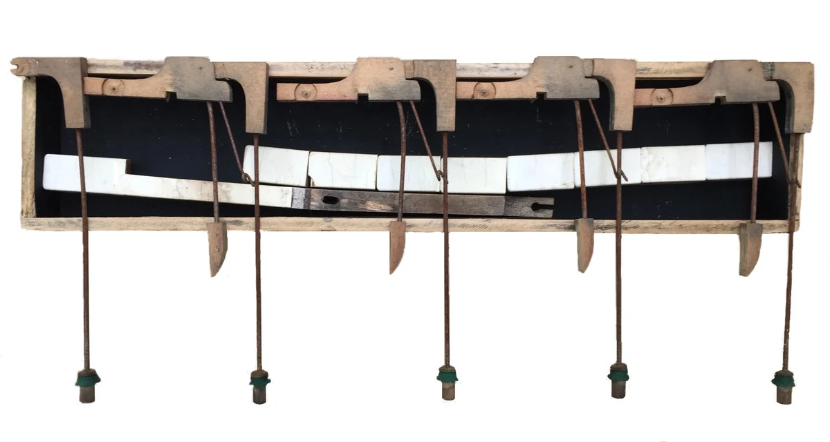 Andante, wall assemblage of weathered wood, piano keys and hanging rusted rods, Hildinger-Reisner Series, 18 x 8 x 3 inches, 2021